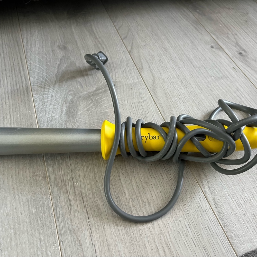 Gray and Yellow Curling Iron